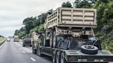Military truck on a hauler