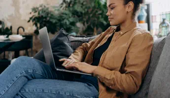 “User comparing auto transport quotes on bidding website”