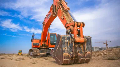 Transport an excavator safely