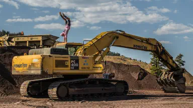 Moving large machinery with specialized heavy-haul trailers and rigging equipment