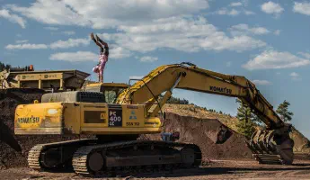 Moving large machinery with specialized heavy-haul trailers and rigging equipment